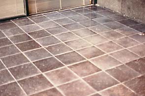 Belgian limestone floor before polishing by International Stoneworks products. Belgian limestone floor before polishing