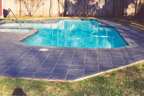 Flamed granite pool deck before enhancement using Seal&Go Enhancer S. Before Flamed Granite Restoration