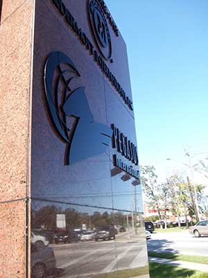 Pegasus International granite wall after restoration with Ver Glow #2. Granite Wall After Restoration
