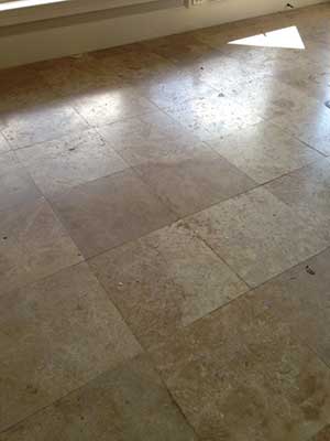 Residential travertine floor - Before Residential travertine floor - Before