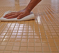 Wiping grout sealing spray. | International Stoneworks