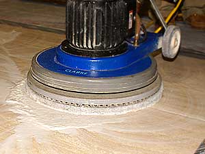 Travertine tile being polished