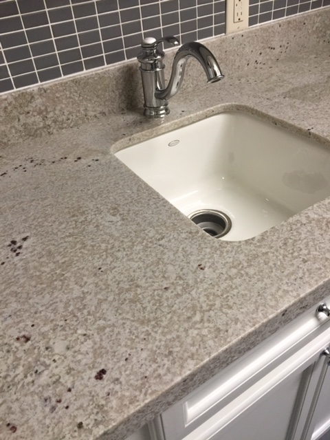 how to remove calcium deposits from granite sink