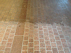 Before and after cleaning of natural stone floor.